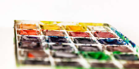 Art palette with colorful paints. Close-up view. Drawing circle. Selective focus.の写真素材