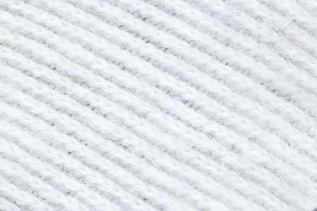 Knitted loops background. Knitted texture. White Knitted Fabric Texture. White knitting wool texture...