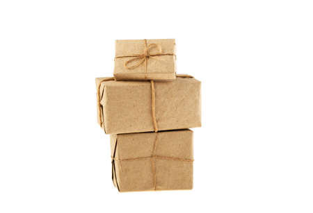postal packet packed in gray paper bundled rope isolated on white background