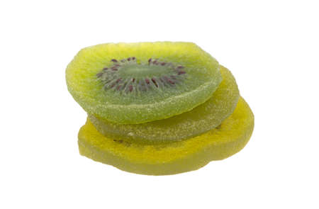 dried kiwi slices isolated on a white backgroundの写真素材