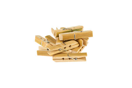 a lot of clothespins of bamboo on a white backgroundの写真素材
