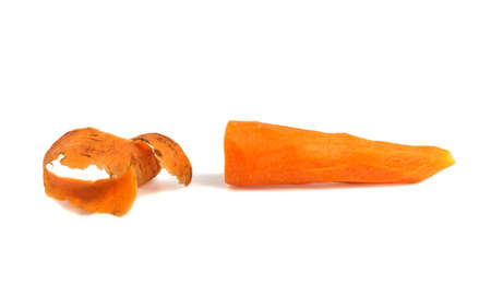 yellow carrots peeled isolated on white backgroundの写真素材