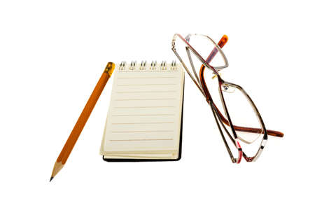 Notebook and pencil and glasses on a white background