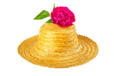Straw hat and peony on a white backgroundの写真素材