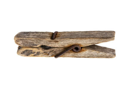 Old clothespin on a white backgroundの写真素材