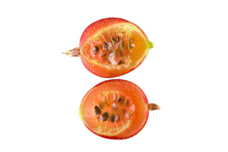 Pink gooseberry cut on white backgroundの写真素材