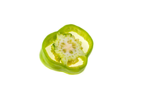 Sliced slice of green pepper on white backgroundの写真素材