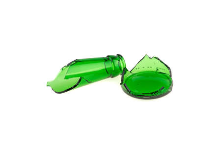 broken glass bottle green isolated on white backgroundの写真素材