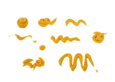 a drop of mustard on a white background