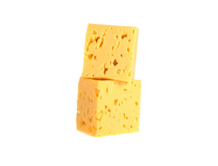 cubes of cheese on a white backgroundの写真素材