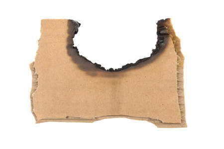 a piece of cardboard is burned out on a white backgroundの写真素材