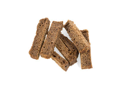 crackers sticks of dark bread isolated on white background