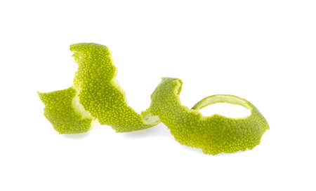 lime skin spiral isolated on white backgroundの写真素材