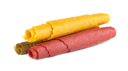 Isolated sweet pureed fruit pastila on a white backgroundの写真素材