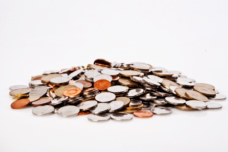 different colour coins on white backgroundの写真素材