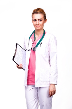 professional medic holding a clipboard with stethoscope on whiteの写真素材