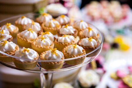 colorful cakes and candy on a  tableの写真素材