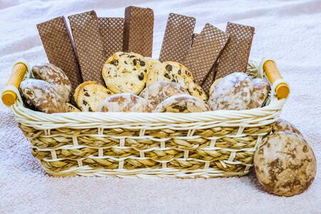 Variety of appetizing cookies in basket, close upの写真素材