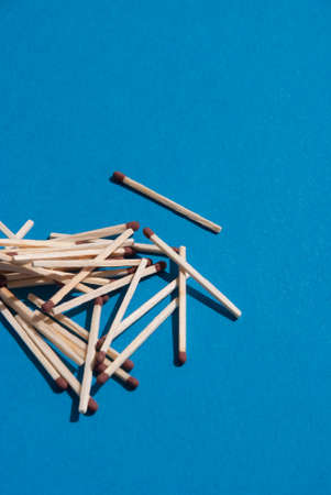 Matches on light blue background