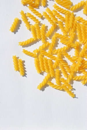 Rotini Pasta on white canvas backgroundの写真素材