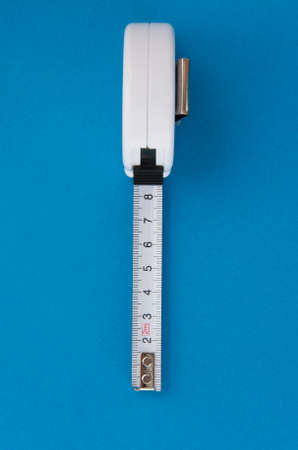 Tape Measure on light blue background.の写真素材