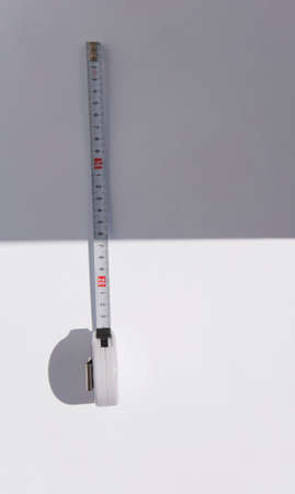 Tape Measure on grey background.の写真素材