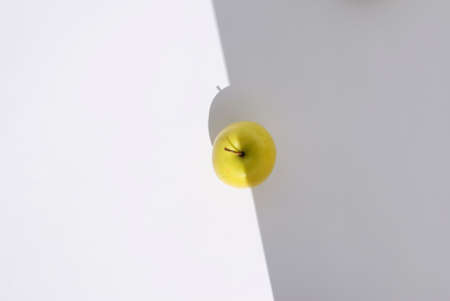 Fresh Yellow Apple on light greybackground. の写真素材