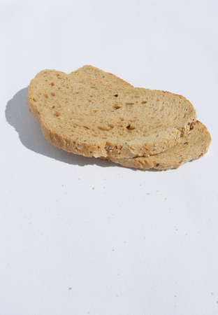 Slices of Bread on white canvas backgroundの写真素材