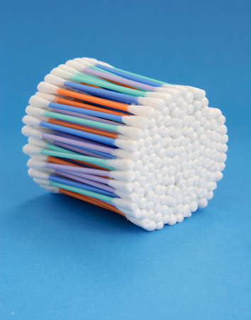 Cottons swabs on blue backgroundの写真素材