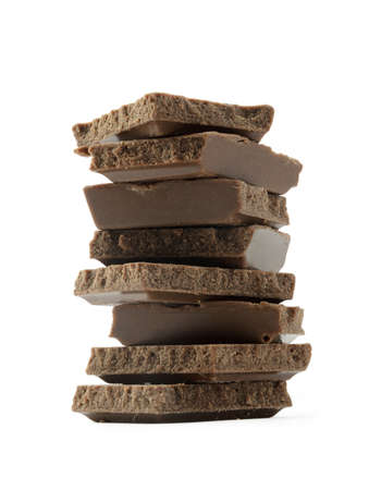Stack of brown chocolate isolated on white backgroundの写真素材