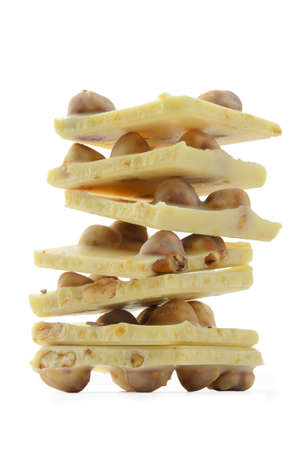 Stack of white chocolate isoalted on white backgroundの写真素材