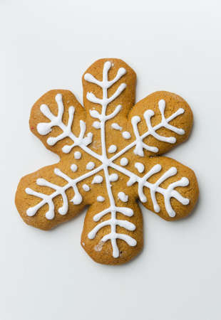 Homemade gingerbread star cookie over white background, above viewの写真素材