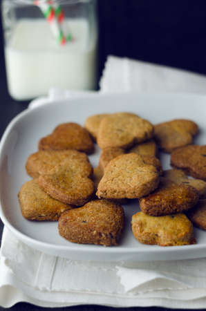 Homemade heart shaped cookies, over dark backgroundの写真素材