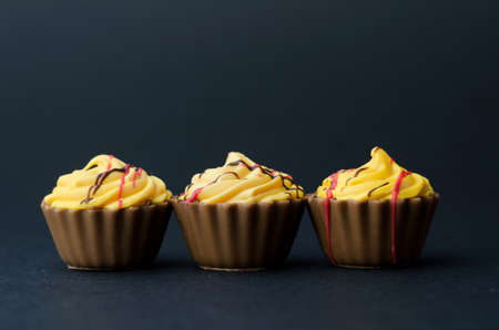 Many Chocolate Cup Cake over black backgroundの写真素材