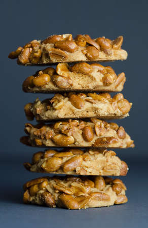 Stack of Homemade cookies with peanuts over blue backgroundの写真素材