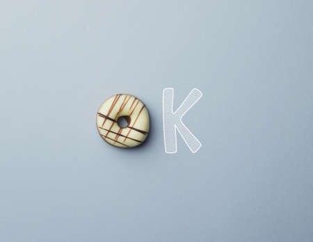 Donut with a doodle text "ok" conceptの写真素材