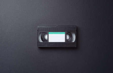 Single VHS Cassette in the center of the image with copy space for text or other designの写真素材