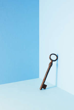 Vintage key in a blue cubeの写真素材