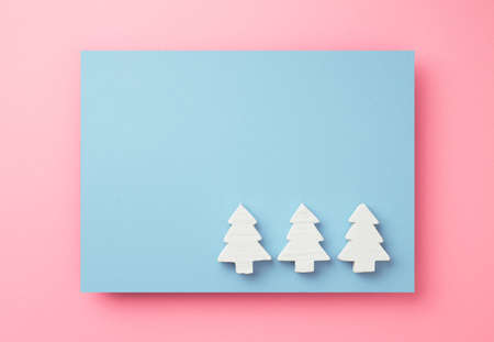 Christmas card background with christmas treesの写真素材