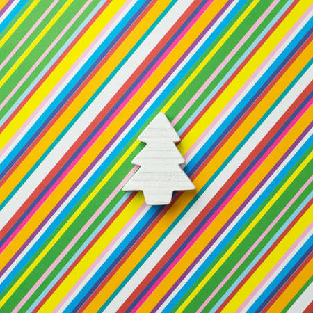 Christmas Tree over a colorful backgroundの写真素材