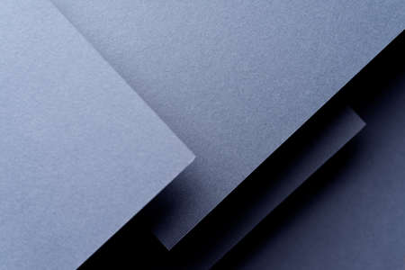 Dark abstract background inspired by material design using cardboard and paper