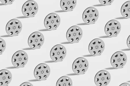 Multiple film rolls organized in a row over white background - 3D Renderingの写真素材