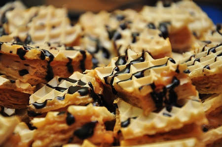 Macro chocolate waffers with syrup, tasty