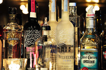 Bottles of different kind of drinks at a barのeditorial素材