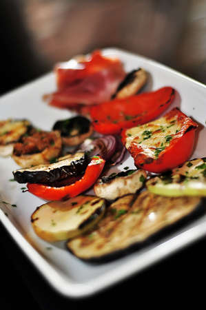 Plate with mushrooms, pepper and onion appetizersの写真素材