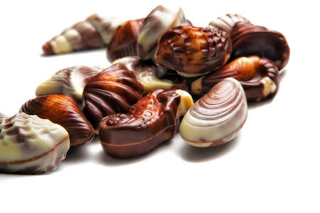 Chocolate seashells isolated on whiteの写真素材