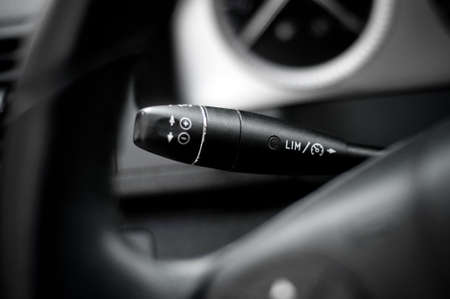 Detail of speed  limitation and cruise control panel in modern car
