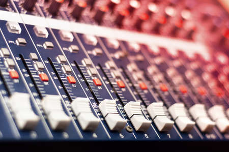 Close-up of music mixer in audio studioの写真素材