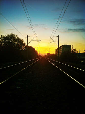 Symmetric railway and reflection of sunsetの素材