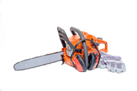 Gasoline powered chainsaw with protective gear and accesories isolated on white backgroundの写真素材